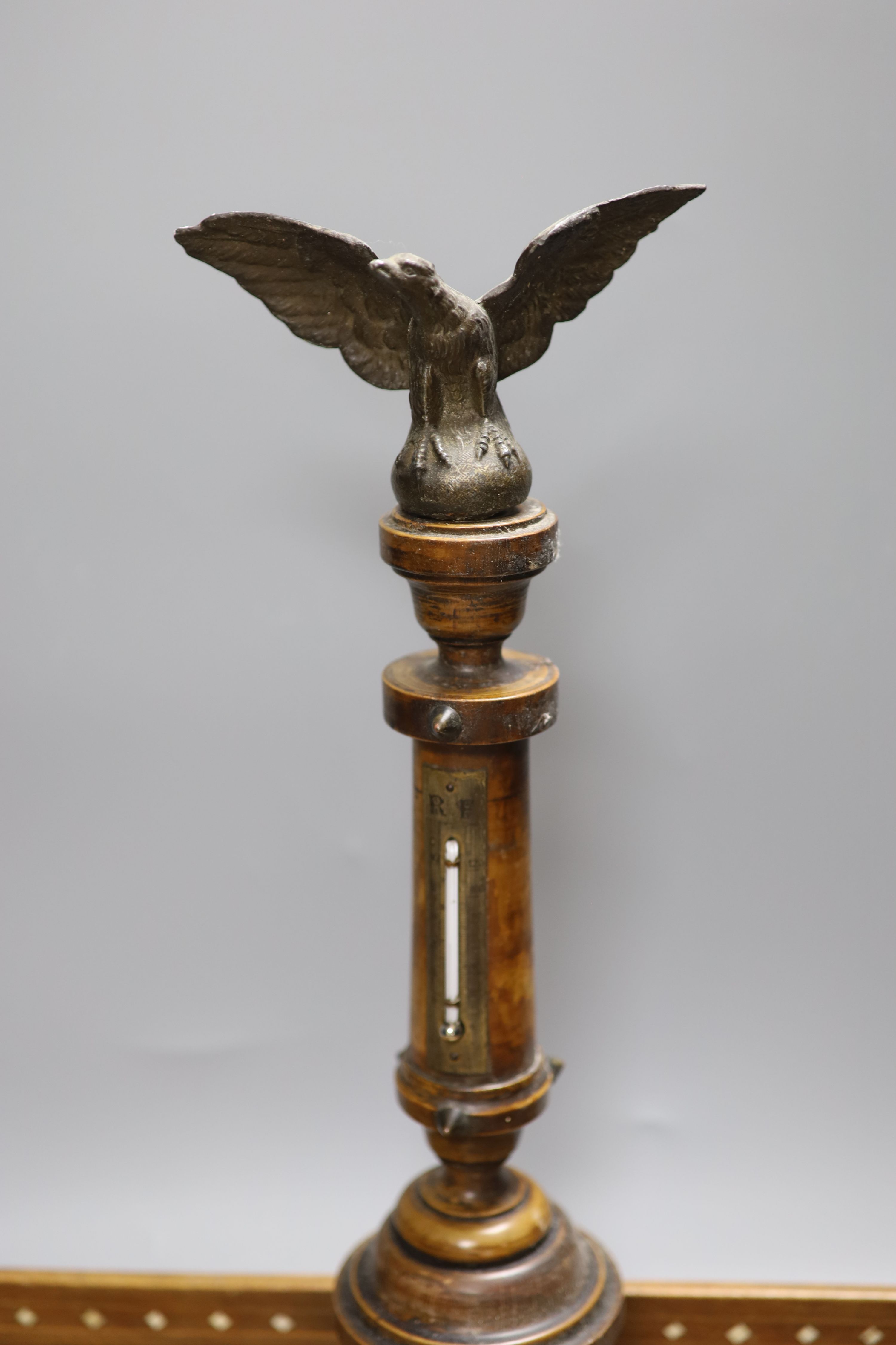 A Victorian eagle surmounted wooden columned table thermometer and an ornate inlaid tray, length 46.5cm